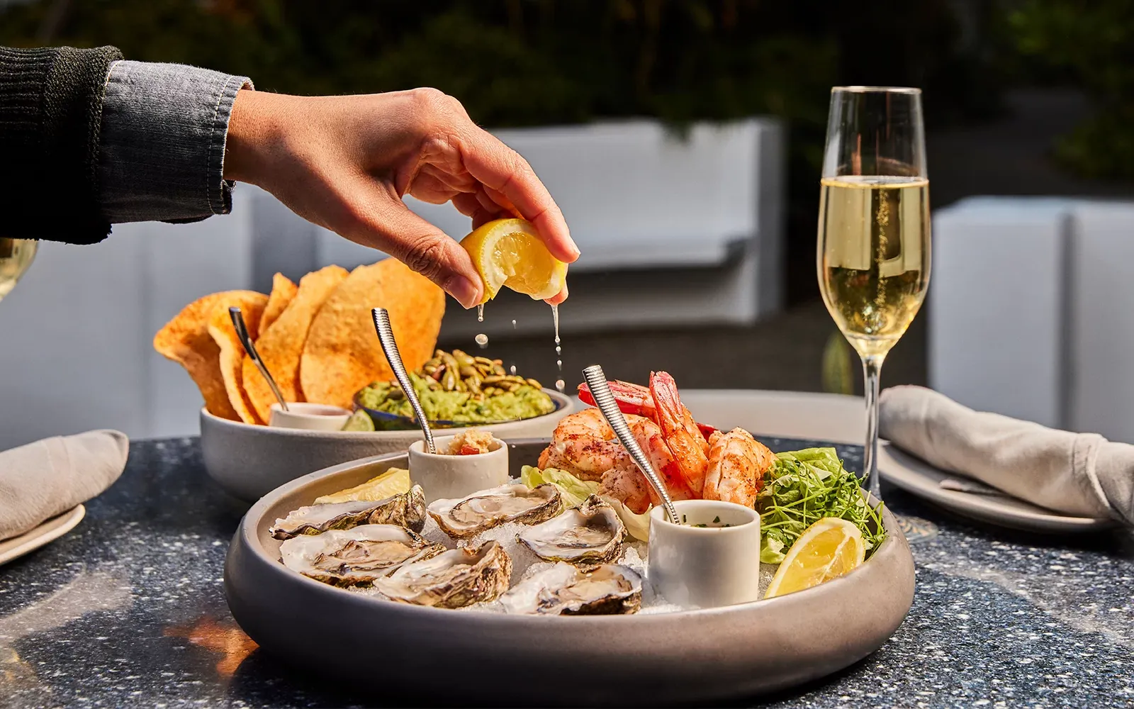 Seafood and champagne served at Cavatina’s garden restaurant