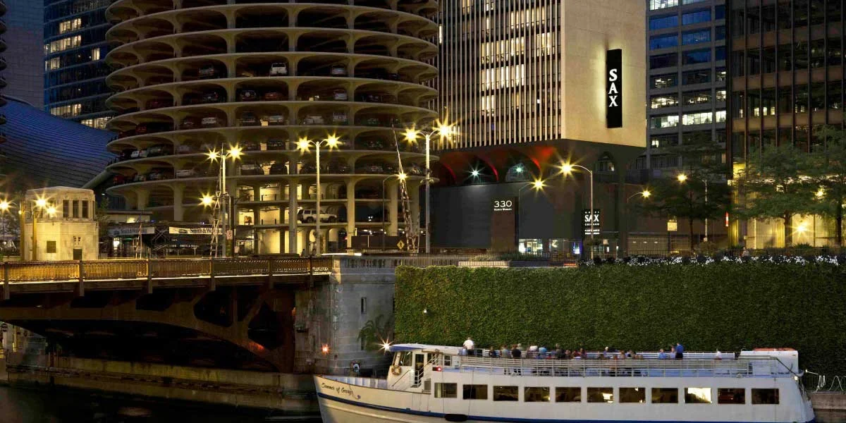 Hotel SAX Chicago building on the river at night