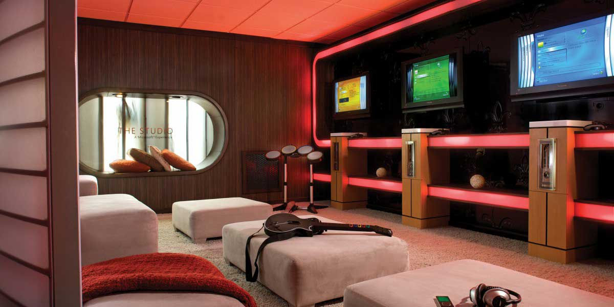 Hotel SAX Chicago Xbox-powered gaming floor with screens, instruments, and lounge seating