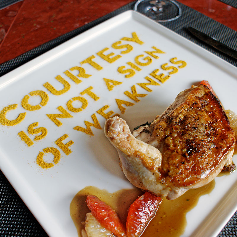 Playa Restaurant dish with Courtesy is not a sign of weakness message
