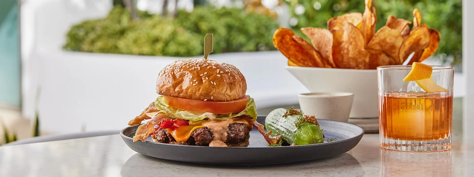 Cavatina burger, chips, and cocktail service